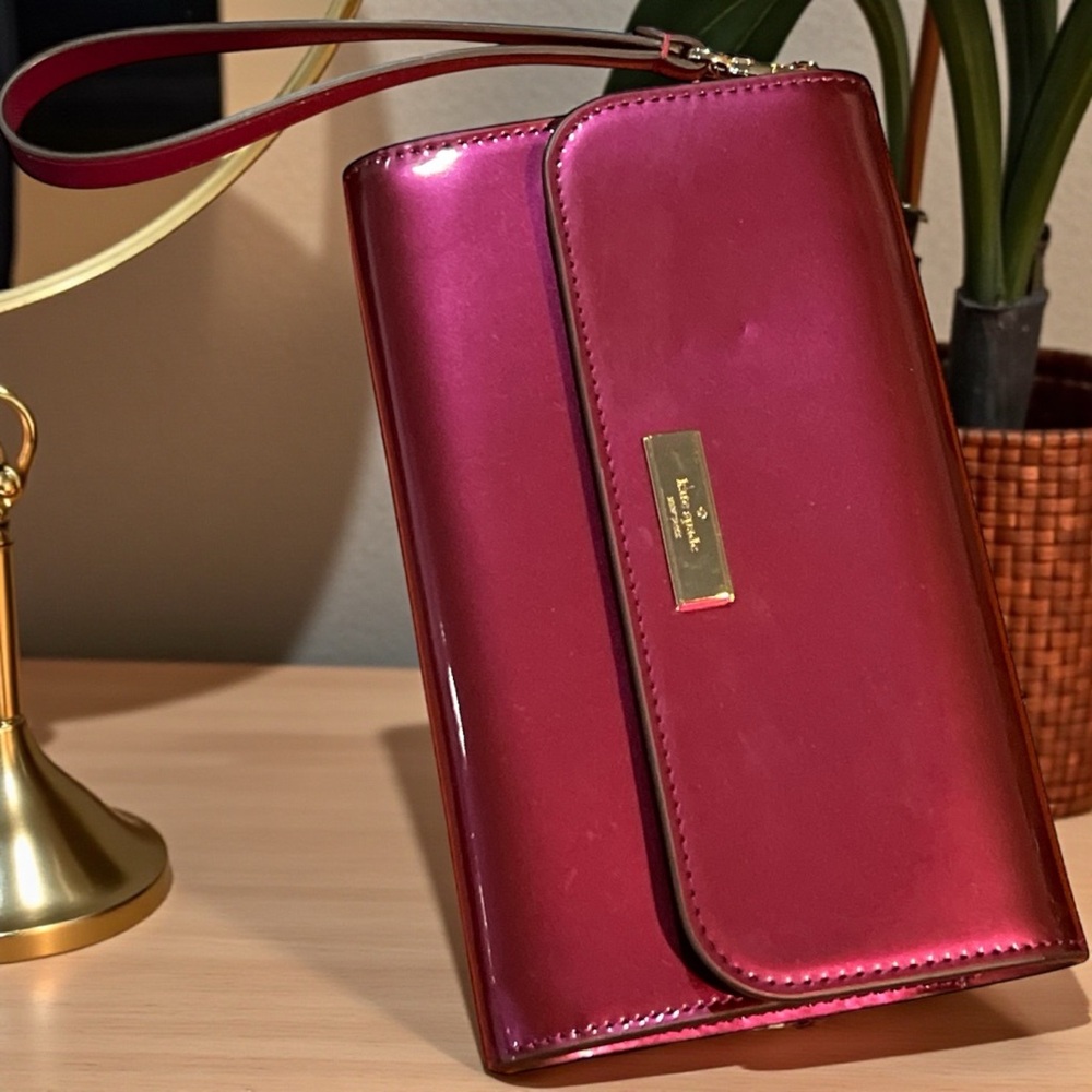 Kate Spade Kenzie Metallic Dark Raspberry Wristlet Clutch